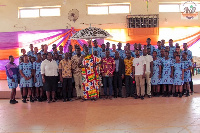 Some of the students in a group photo with traditional leaders and officials of Kwahu Republic