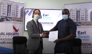 A photo of Erwan Garnier and Alfred Danso Darkwah during the partnership signing ceremony