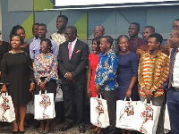 The beneficiaries in a group photograph with Ecobank MD, Mr Daniel Sackey