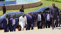 Finance Minister, Ken Ofori-Atta (in white) being accompanied by Dr Bawumia and others