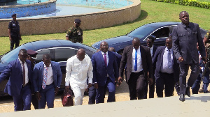 Finance Minister, Ken Ofori-Atta (in white) being accompanied by Dr Bawumia and others