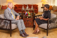 Ambassador Ronald strikker with host, Harriet Nartey