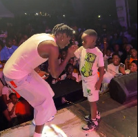 Inviting the boy on stage, they engaged in a spirited dance battle.