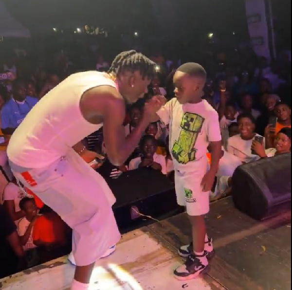 Inviting the boy on stage, they engaged in a spirited dance battle.