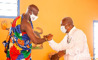 Tetrete Okuamoah Sekyim II (L) with former President John Mahama (R)