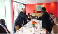 Mr. Kitack Lim [Left] presenting the award to Dr. Kofi Mbiah [Right]