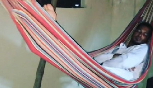 Actor Van Vicker captured sleeping in a hammock outside