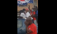 In a video some NPP supporters are seen rallying in the bucket of a police pickup truck