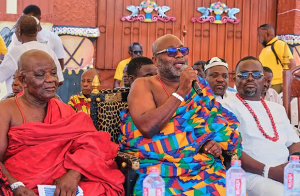 Nii Ahene Nunoo, the Paramount Chief of the Abola Traditional Area (middle)