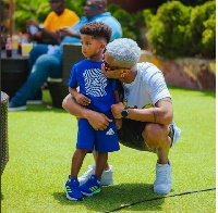 Artiste KiDi and son Zane