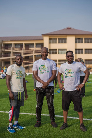 Coach Tanko with Hussein Hassan and a member of the club