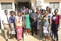 Some of the beneficiary students in a photograph with the Bongo DCE