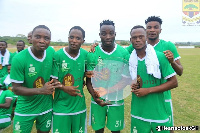 Elmina Sharks display their trophy