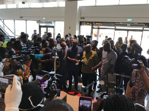 Mr Yaw Kwakwa briefing the president and journalists at the airport