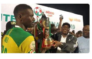 Kano Pillars skipper, Ali lifting the trophy