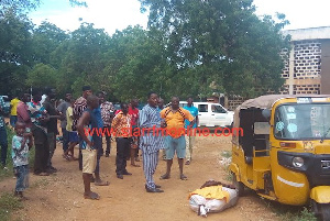 The regional storekeeper ran into his office after he was caught with the school uniforms at the GES