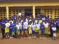 The female staff of EXP Ghana with some school girls