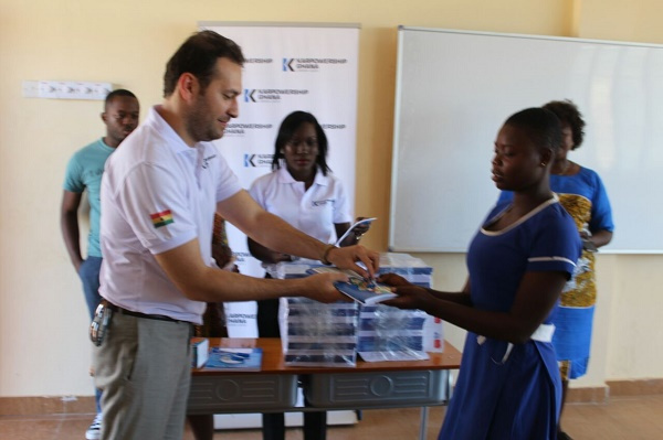 Karpower Ghana team presenting books to  Manhean Anglican Cluster of Schools