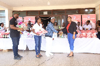 Bishop Dr. Charles Cofie Hackman presenting the items to officials of the hospital