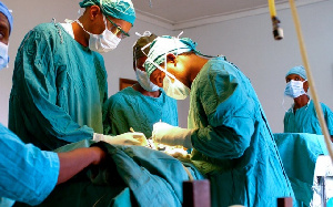 Doctors performing a surgical procedure