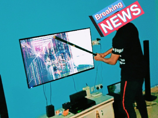 A man smashing his TV after losing a bet