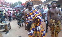 Chief fetish priest Nana Kofi Adjei clad in Kente