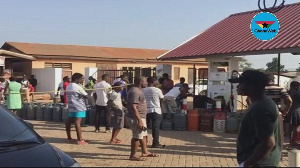 People queuing to fill their gas cylinders at Ashaley Botwey