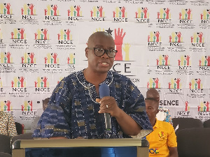 Bright Kwabla Agbodeka addressing the audience at the event