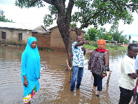 Savelugu MCE in blue jeans accessing the situation