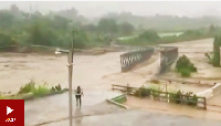 Hurricane Fiona flood water destroys Puerto Rican bridge