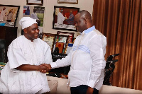 Dr Hafix Bin Salih shaking hands with NPP National Treasurer hopeful, Dr Charles Dwamena