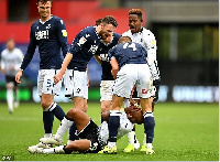 Millwall coach Gary Rowett accused the Swansea striker Andre Ayew of 'embarrassing' behaviour