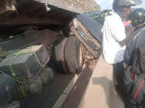 A photograph of the mangled vehicle