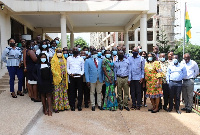 The deputy sanitation minister, Amidu Issahaku Chinnia in a group photo with staff at CWSA