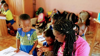 Teacher Ewuraama and some of her pupils