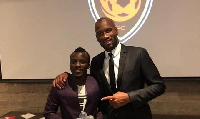 Solomon Asante with Didier Drogba