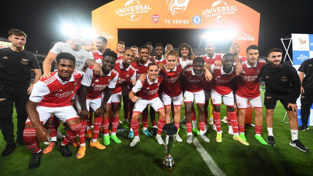 Arsenal players celebrate beating Chelsea