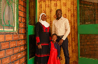 Iris Osnia Ouattara with mum and dad