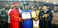 Dr Frank Adjei (in blue outfit) with his citation