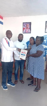 Albert Arkoh Wiredu (left) receives his nomination form