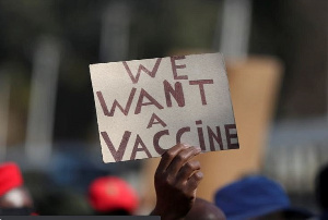 Supporters of the Economic Freedom Fighters (EFF) march to demand a rollout of COVID-19 vaccines