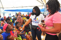 Naada Jinapor interacting with some of the children