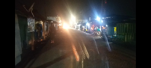 An illuminated street in Krobo