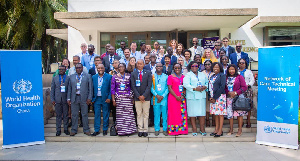 Participants in a group photo after the first session