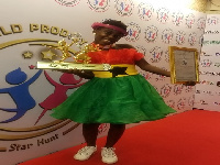 DJ Switch displaying her award