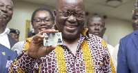 President Nana Addo Dankwa Akufo-Addo holding his Ghana card