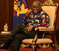 Akufo-Addo in his infamous presidential chair