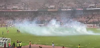 Tear gas was fired at a point to deal with the pitch invaders