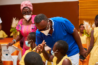 Totobi Quakyi interacting with the children