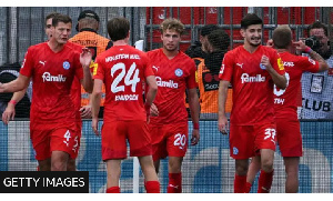 Jann-Fiete Arp's penalty earned Holstein Kiel the second point in their Bundesliga history